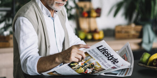 close-up-man-reading-newspaper close-up-man-reading-newspaper